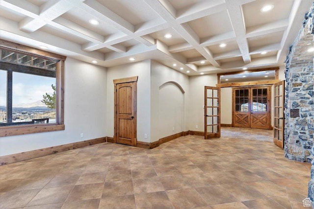 246 E Woods Creek Dr, Morgan, UT 84050 - unfurnished room featuring beamed ceiling, french doors, and coffered ceiling