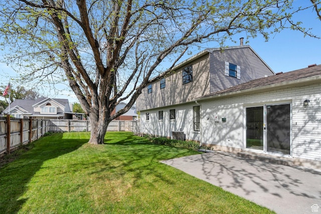 1383 N 1220 W, Provo, UT 84604 - back of house featuring a lawn, a fenced backyard, and a patio area