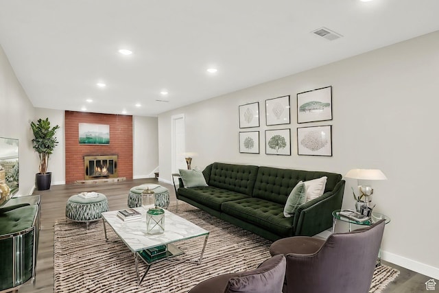 967 E 2800 N, North Ogden, UT 84414 - living area featuring recessed lighting, baseboards, visible vents, a fireplace, and wood finished floors