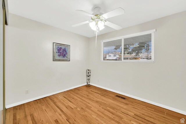 967 E 2800 N, North Ogden, UT 84414 - spare room with baseboards, visible vents, a ceiling fan, and wood finished floors