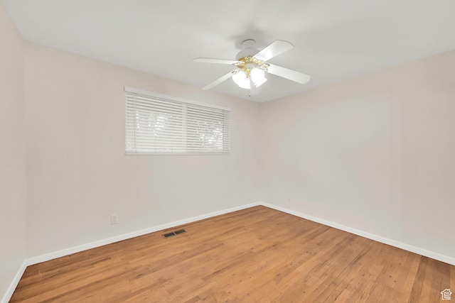 967 E 2800 N, North Ogden, UT 84414 - spare room featuring light wood-type flooring, baseboards, and a ceiling fan