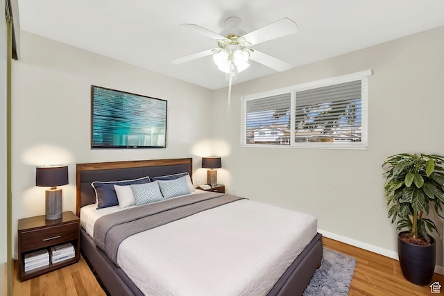 967 E 2800 N, North Ogden, UT 84414 - bedroom with baseboards, a ceiling fan, and light wood-type flooring
