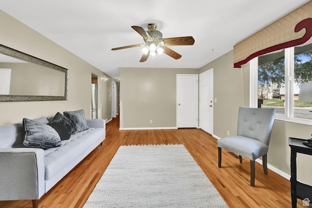 967 E 2800 N, North Ogden, UT 84414 - living area featuring a ceiling fan, baseboards, and light wood finished floors