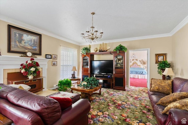 living room with a tile fireplace, crown molding, a textured ceiling, and a notable chandelier