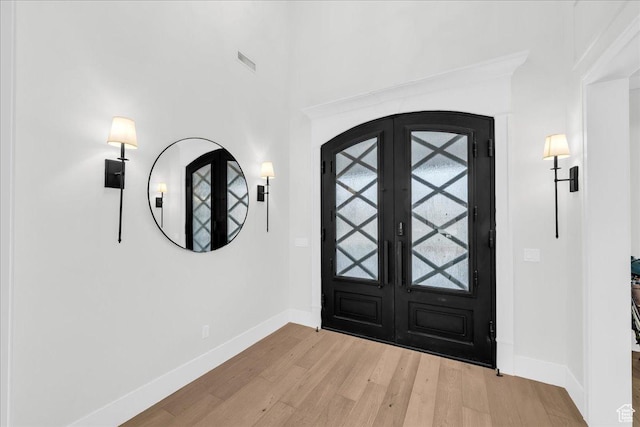 4009 S 2420 E, St George, UT 84790 - foyer featuring light wood-style floors and french doors