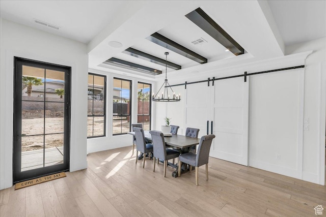 4009 S 2420 E, St George, UT 84790 - dining room with a barn door, light wood finished floors, and beam ceiling