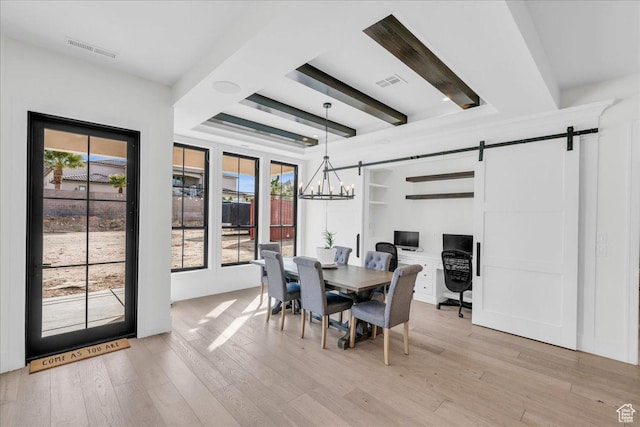 4009 S 2420 E, St George, UT 84790 - dining room featuring a barn door, light wood finished floors, beamed ceiling, and a chandelier