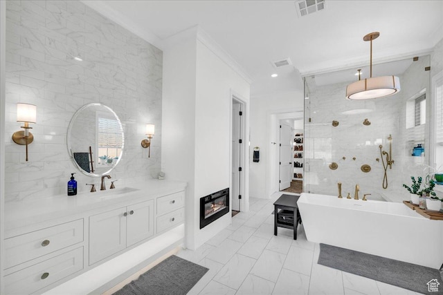 4009 S 2420 E, St George, UT 84790 - bathroom with crown molding, a freestanding tub, vanity, marble look tile flooring, and a shower