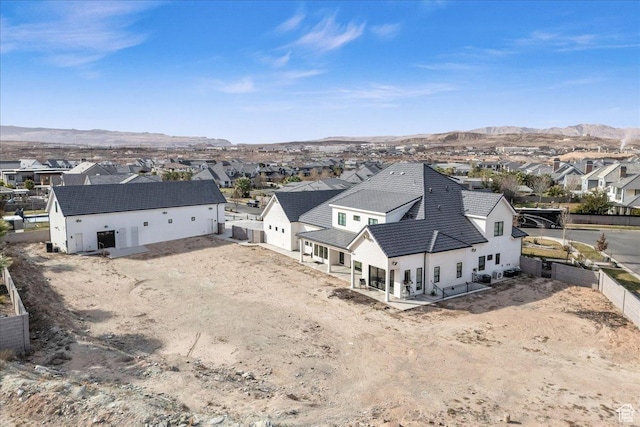 4009 S 2420 E, St George, UT 84790 - aerial view of residential area with a mountain backdrop