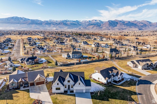 drone / aerial view featuring a mountain view