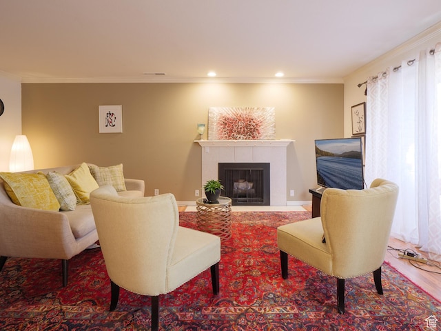 875 E Arrowhead Ln S Unit 42, Murray, UT 84107 - living room with wood finished floors, a fireplace, crown molding, and recessed lighting