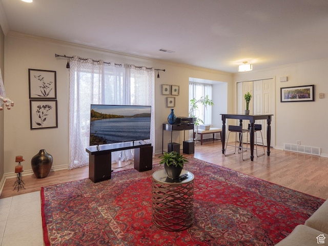 875 E Arrowhead Ln S Unit 42, Murray, UT 84107 - living area with crown molding and wood finished floors