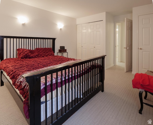 875 E Arrowhead Ln S Unit 42, Murray, UT 84107 - bedroom with carpet and a closet