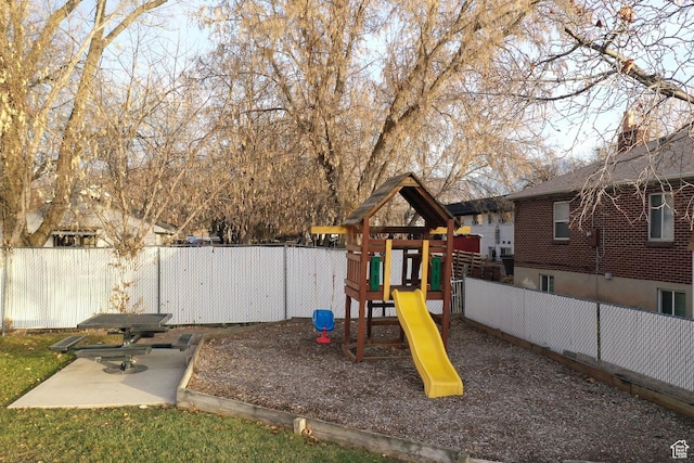 875 E Arrowhead Ln S Unit 42, Murray, UT 84107 - view of playground with a fenced backyard