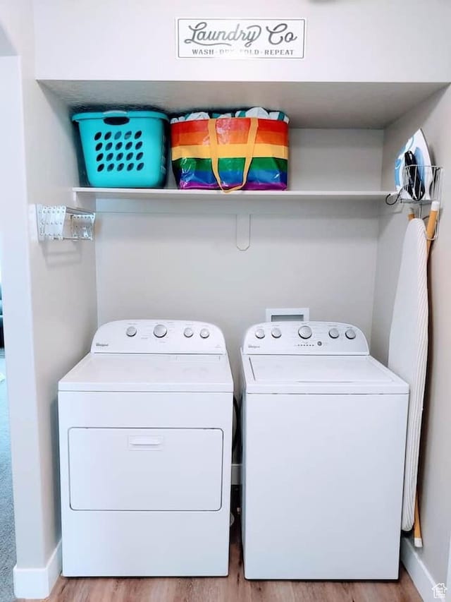 276 W Seasons Ln, Garden City, UT 84028 - laundry area featuring separate washer and dryer and light wood-type flooring