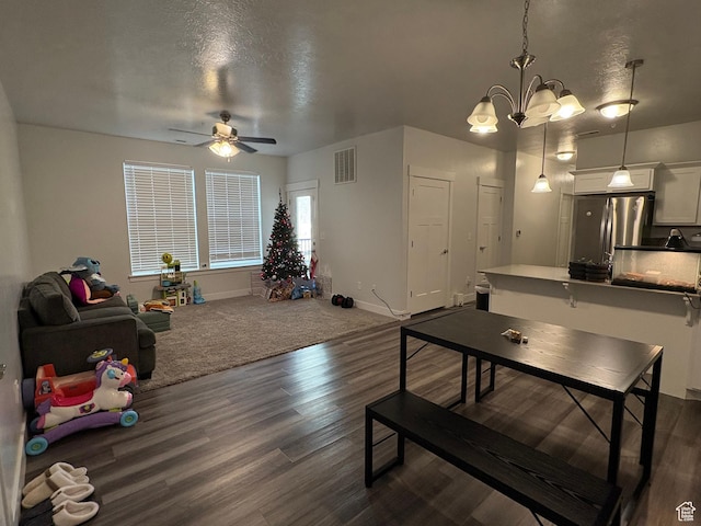 1772 W Terra Vista Ln Unit G101, Saratoga Springs, UT 84045 - interior space with a textured ceiling, ceiling fan with notable chandelier, and dark hardwood / wood-style floors