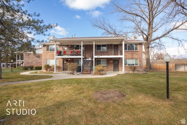 4748 S 700 E Unit 97, Murray, UT 84107 - view of property with stairway and fence