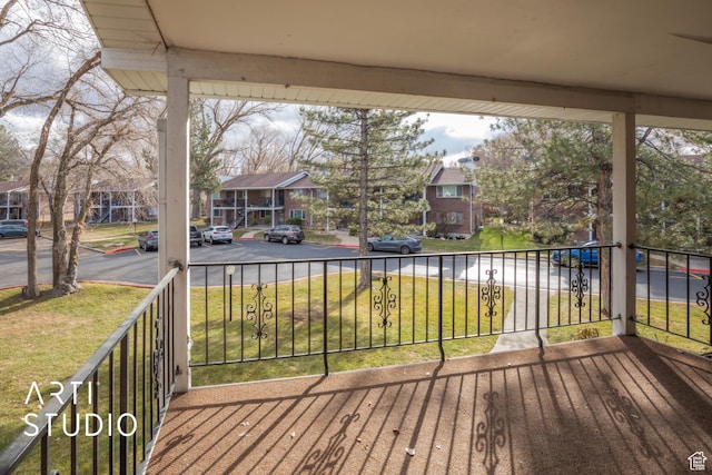 4748 S 700 E Unit 97, Murray, UT 84107 - wooden deck with a residential view and a lawn