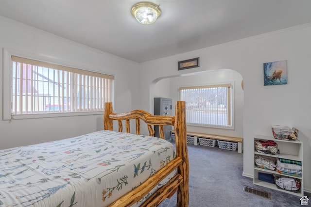 906 S Main St, Grace, ID 83241 - bedroom with carpet floors and crown molding