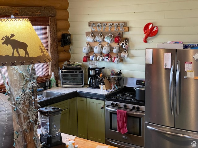 2637 N Water Canyon Ave, Huntsville, UT 84317 - kitchen featuring tile countertops, green cabinets, sink, hardwood / wood-style flooring, and appliances with stainless steel finishes