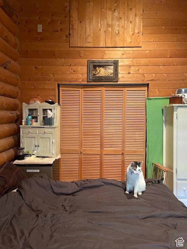 2637 N Water Canyon Ave, Huntsville, UT 84317 - unfurnished bedroom with log walls and a closet