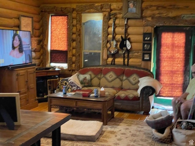 2637 N Water Canyon Ave, Huntsville, UT 84317 - living room with rustic walls and hardwood / wood-style flooring
