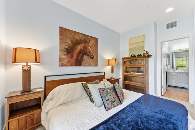 900 Bitner Rd Unit K25, Park City, UT 84098 - bedroom with ensuite bathroom and light hardwood / wood-style flooring