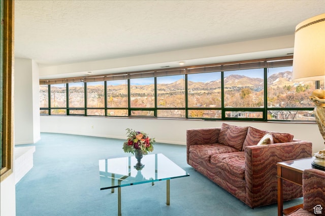 426 S 1000 E Unit 600, Salt Lake City, UT 84102 - carpeted living room with a textured ceiling and a mountain view