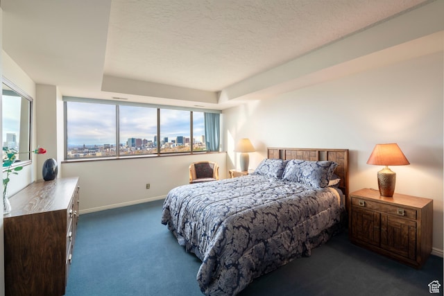 426 S 1000 E Unit 600, Salt Lake City, UT 84102 - bedroom with dark colored carpet and a textured ceiling