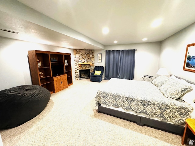 890 N Newberg Pl Unit 3, Garden City, UT 84028 - carpeted bedroom featuring a stone fireplace and recessed lighting