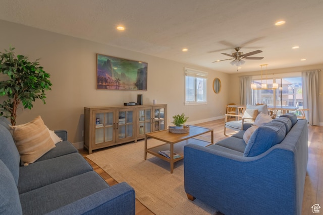 860 S Village Rd Unit Y8, St George, UT 84770 - living room featuring ceiling fan, plenty of natural light, and light wood-type flooring