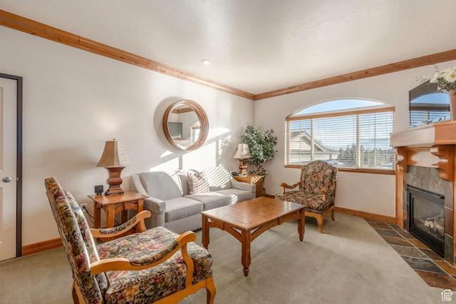 carpeted living room with a textured ceiling, crown molding, and a tiled fireplace