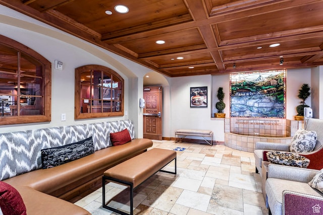living room featuring beamed ceiling, wooden ceiling, and coffered ceiling