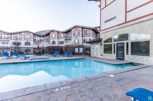 view of pool with a patio area
