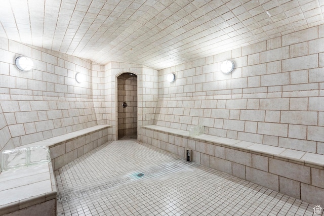 bathroom with tile patterned floors