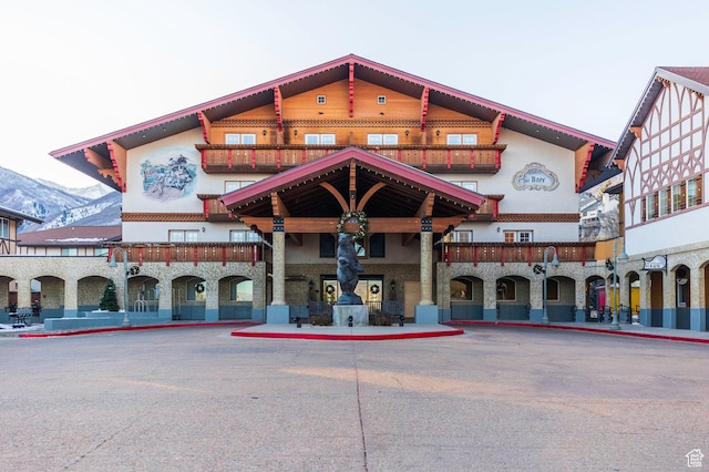 view of building exterior featuring a mountain view