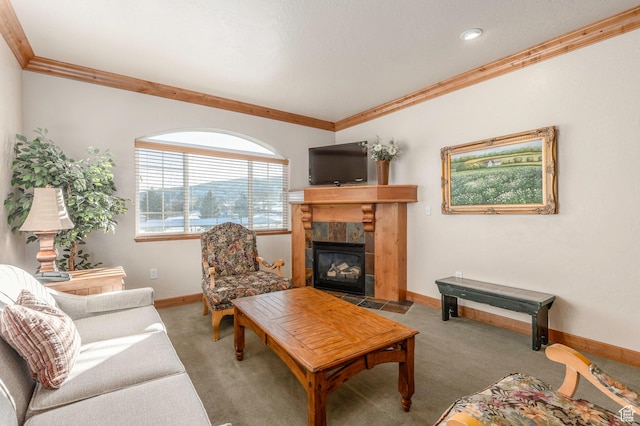 living room with light colored carpet, crown molding, and a tiled fireplace