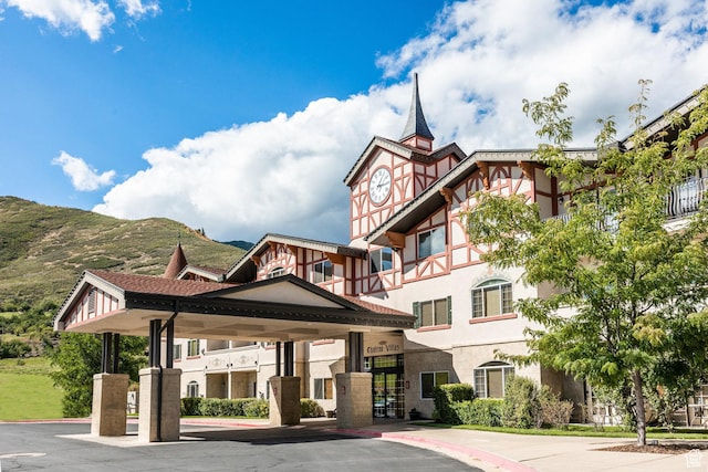 view of building exterior featuring a mountain view