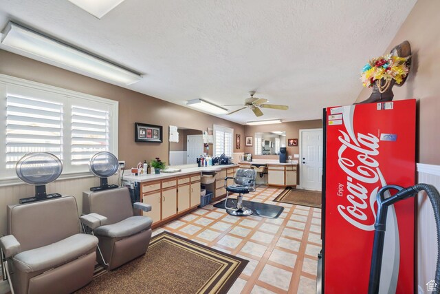 2594 W 1800 N, Farr West, UT 84404 - interior space featuring ceiling fan, a textured ceiling, and a wealth of natural light