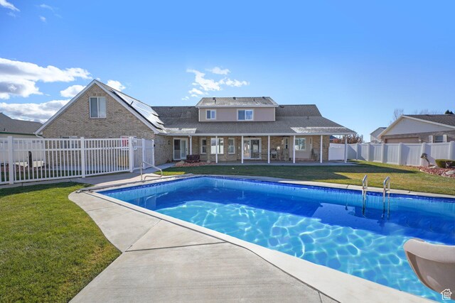 2594 W 1800 N, Farr West, UT 84404 - view of swimming pool with a yard