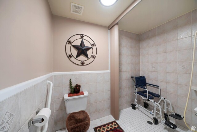 2594 W 1800 N, Farr West, UT 84404 - bathroom featuring tile patterned flooring and tile walls
