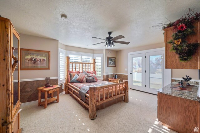 2594 W 1800 N, Farr West, UT 84404 - bedroom featuring light carpet, a textured ceiling, access to outside, and ceiling fan