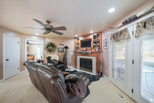 2594 W 1800 N, Farr West, UT 84404 - living room with a fireplace, carpet flooring, and ceiling fan