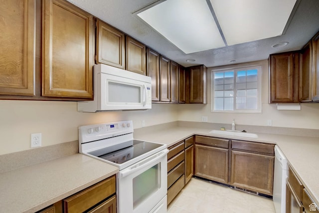 5238 S 2100 W, Roy, UT 84067 - kitchen featuring sink and white appliances