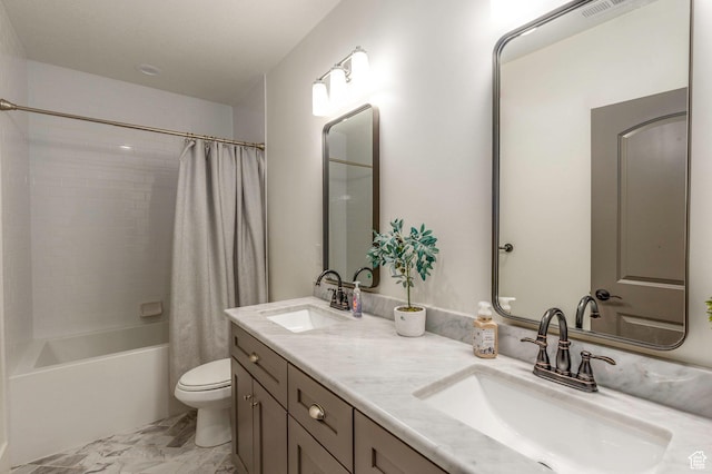 full bathroom featuring shower / bath combination with curtain, toilet, and vanity