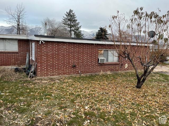 479 N Valeria Dr E, Layton, UT 84041 - view of side of home featuring brick siding