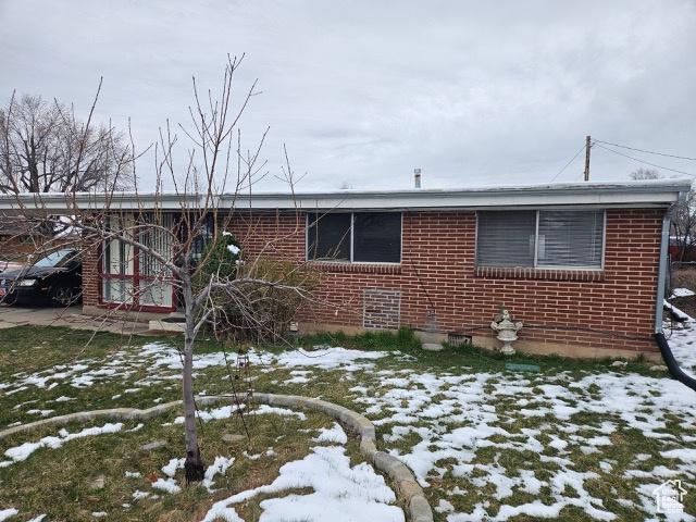 479 N Valeria Dr E, Layton, UT 84041 - view of front of house featuring brick siding