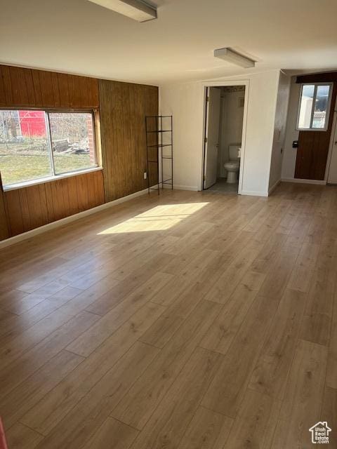 479 N Valeria Dr E, Layton, UT 84041 - unfurnished bedroom featuring wooden walls, baseboards, and wood finished floors
