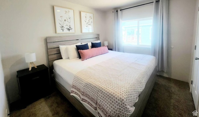 573 S Aspen Dr, Garden City, UT 84028 - bedroom featuring dark carpet