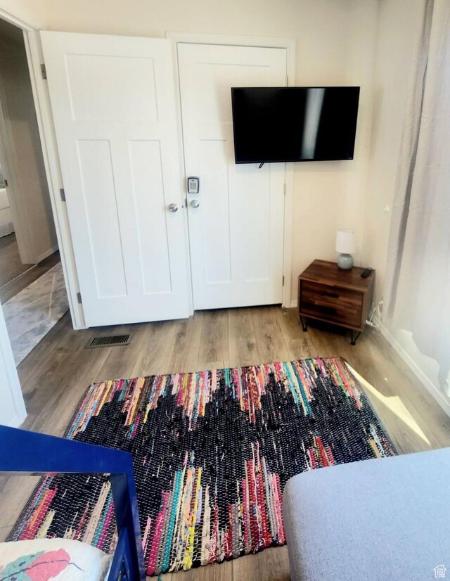 573 S Aspen Dr, Garden City, UT 84028 - bedroom featuring light hardwood / wood-style flooring